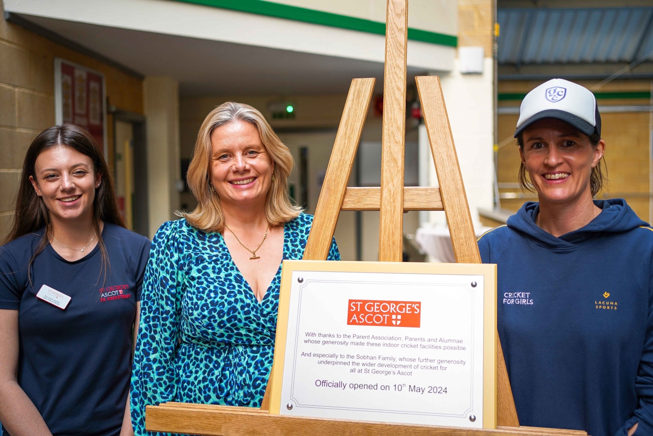 Miss Appleby (Director of Sport), Mrs Hewer (Head), and Lydia Greenway OBE presenting the cricket nets plaque.